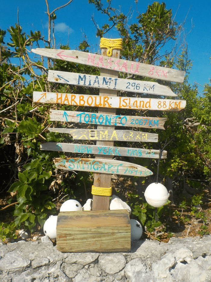 A sign shows that you are miles from you cares, when visiting Pearl Island.