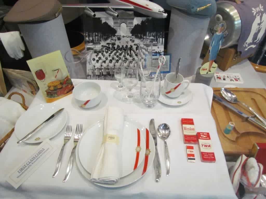 A display showcases the items that would have been used on flights in the 1950's.