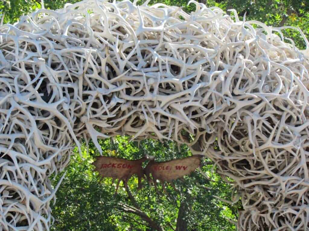 Elk antlers are intertwined to form an arch in a park in Jackson Hole, wyoming.
