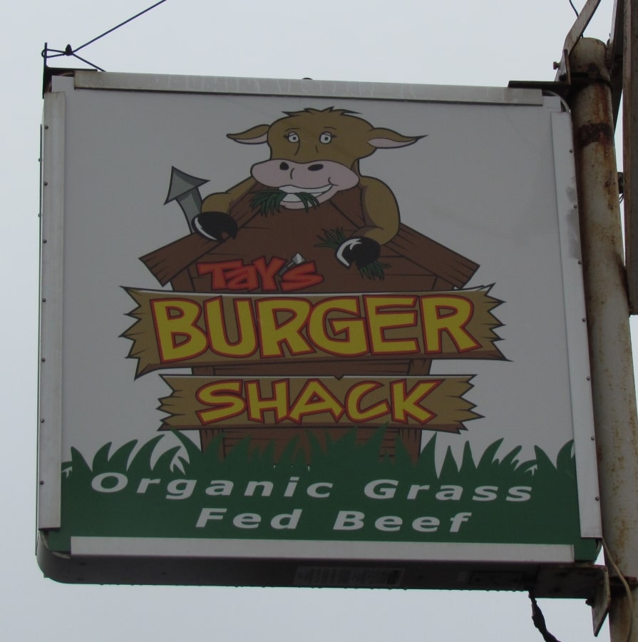 The sign signals customers that they have arrived at Tay's Burger Sack in North kansas City, Missouri.