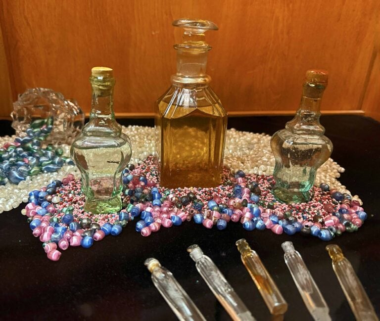 Perfume bottles decorate an exhibit at Arabia Steamboat Museum.