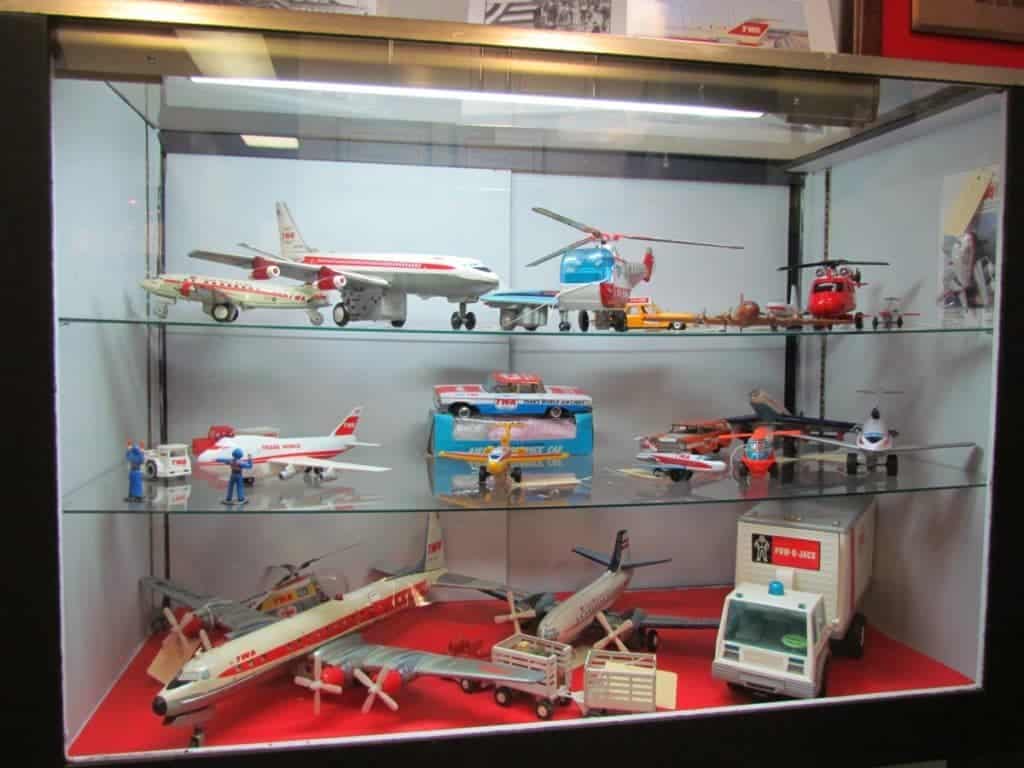 A display case filled with TWA themed toys.