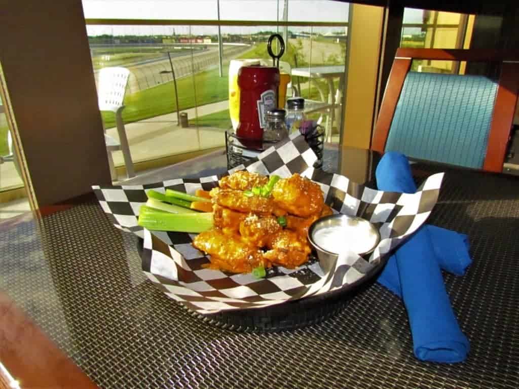 Chicken wings on a table near Kansas Speedway.