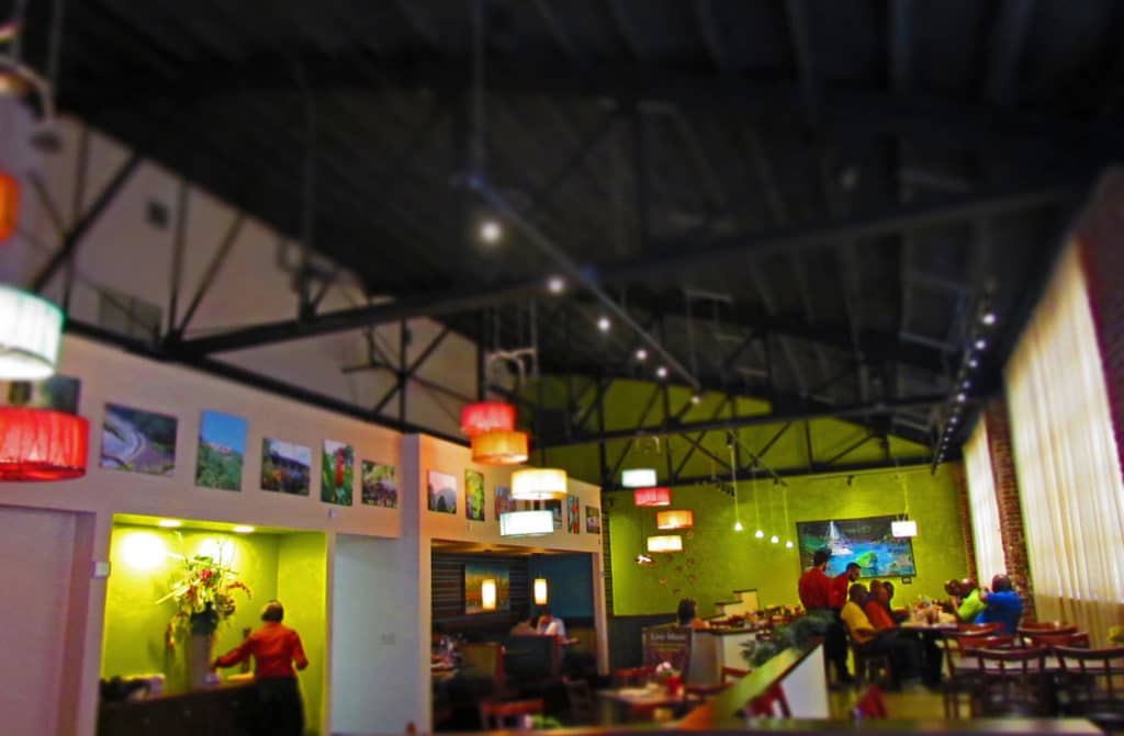 Pictures of Caribbean islands adorn the walls of Sisserou's Caribbean Restaurant.