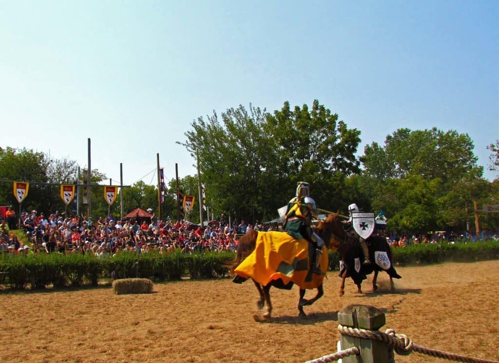 Two knights clash during a jousting match.