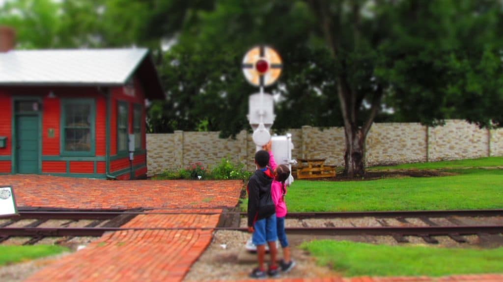 Our grand-kids inspecting a railroad signal.
