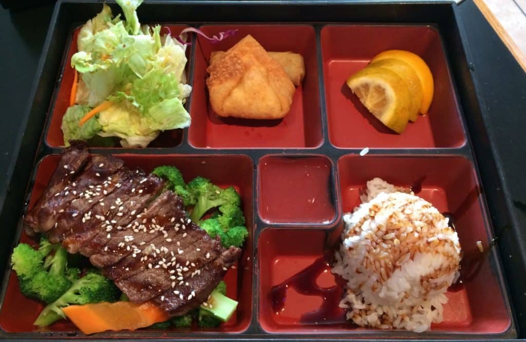 Bento box filled with delicious meal portions featuring Teriyaki Steak.