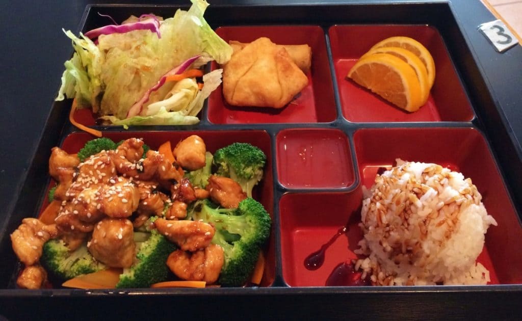 Bento box filled with delicious meal portions featuring Teriyaki Chicken.