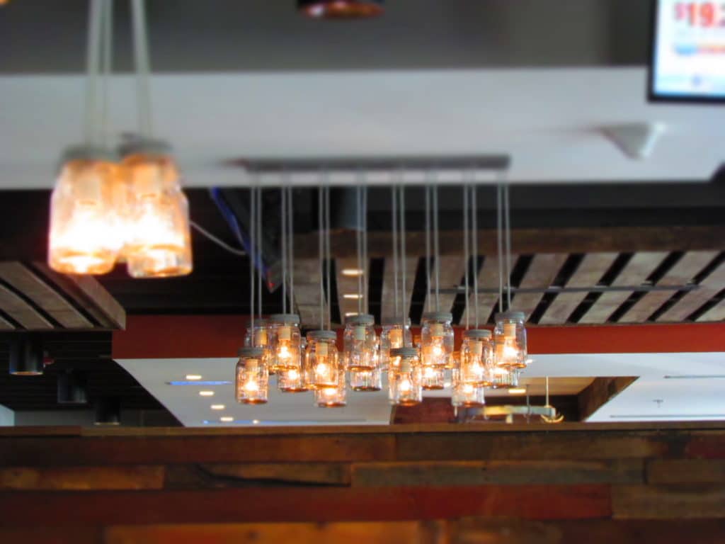 Mason jars are used in the lighting at the signature restaurant in KCK.