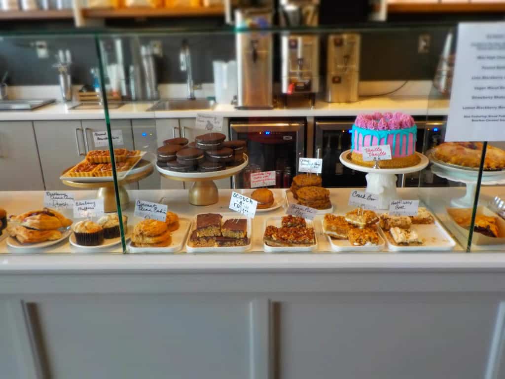 An assortment of cakes, pies, cookies, and other pastries can be found at Antoinette Baking Company.