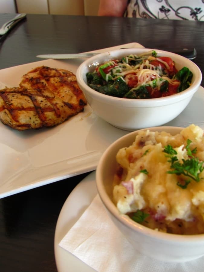 Grilled chicken dinner at Mason Jar comes with roasted garlic Gouda mashed potatoes.