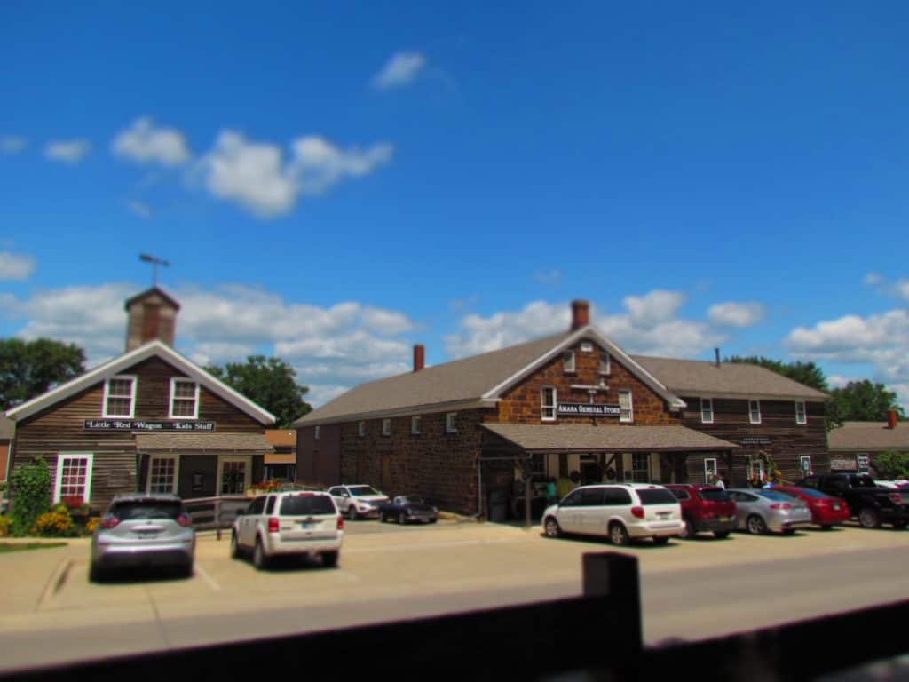 A view of a few of the plain wooden buildings that occupy the Amana Colonies.