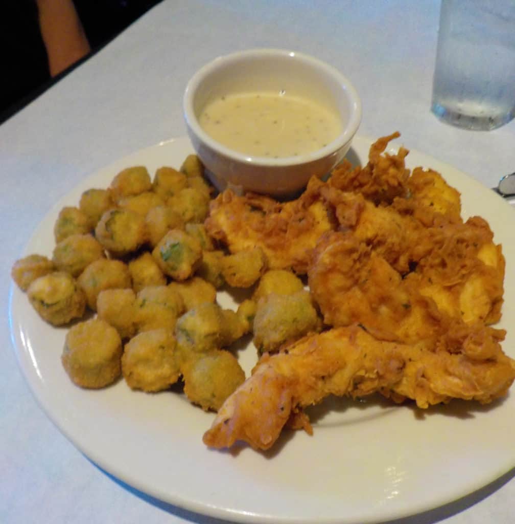 Crispy Chicken Tenders are served with a side order of fried okra.