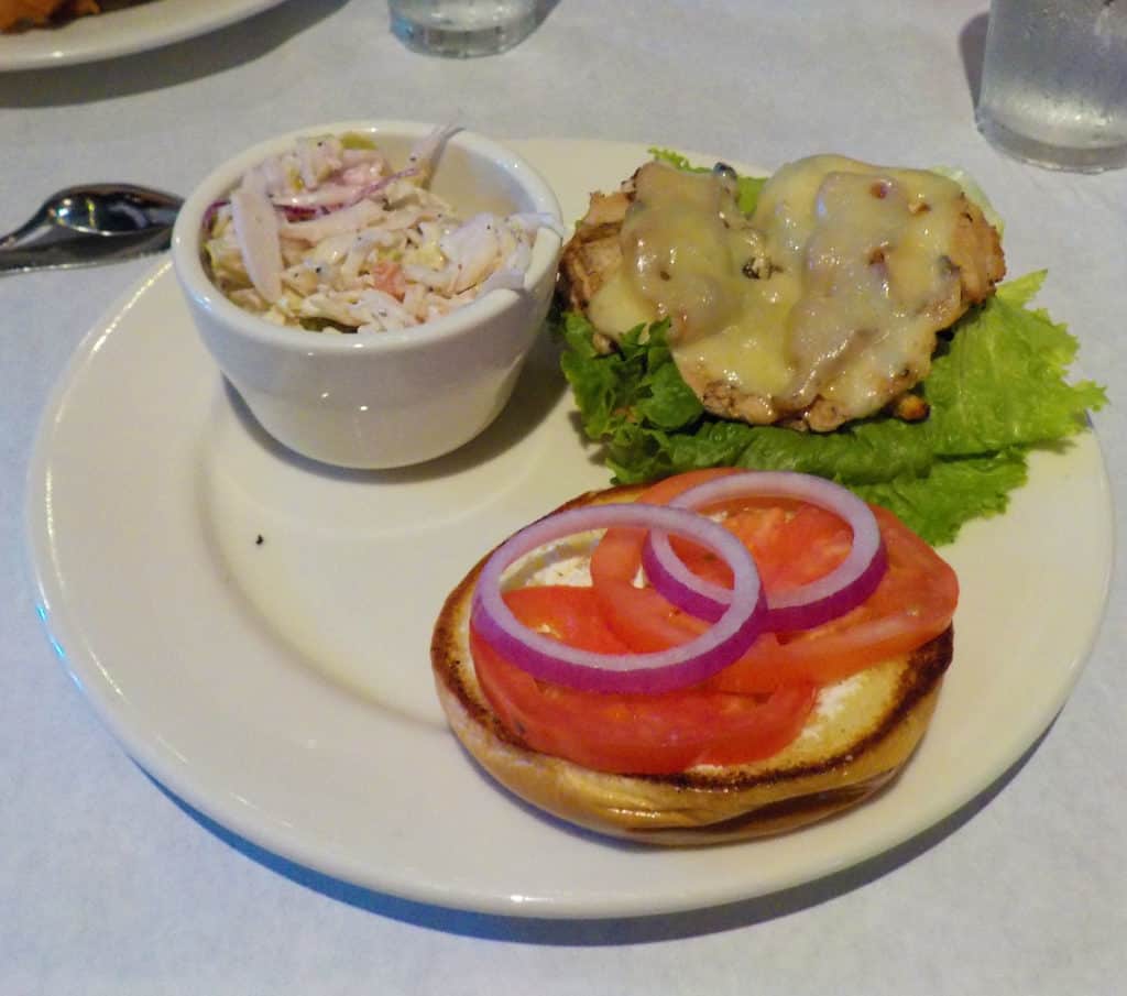 A Chowhouse Chicken Sandwich is served with a side order of cole slaw.