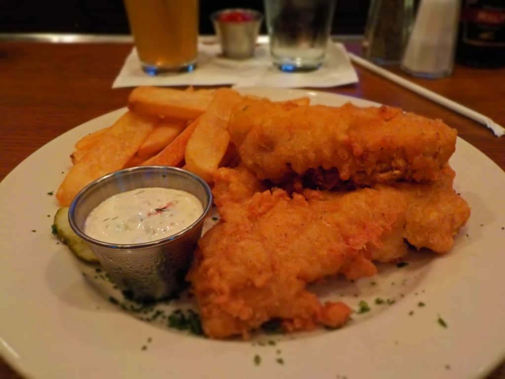 The crispy fish fillets join an order of steak fries to make up the Fish & Chips entree.