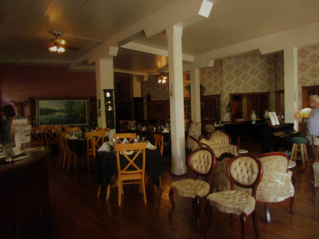 The dining area of the Grand Taverne Restaurant is decorated in Victorian fashion.