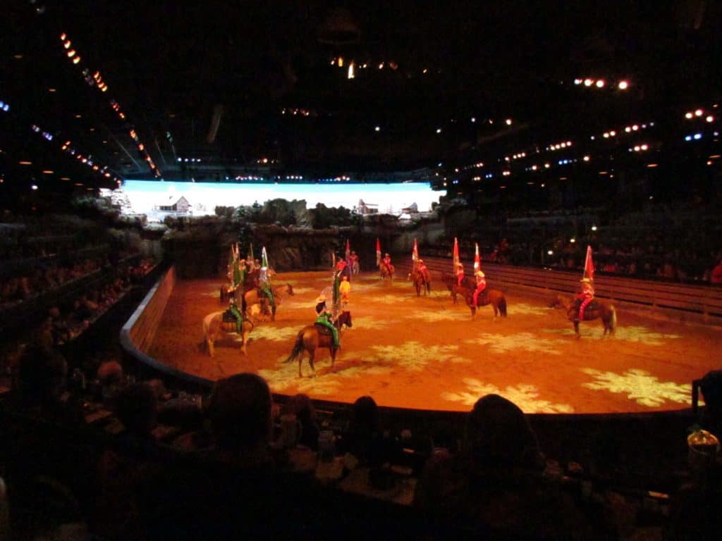 Riders parade around the arena at during various events at Dixie Stampede.