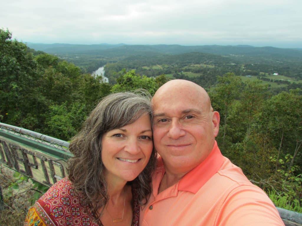 The authors pose for a selfie overlooking an Ozark valley.
