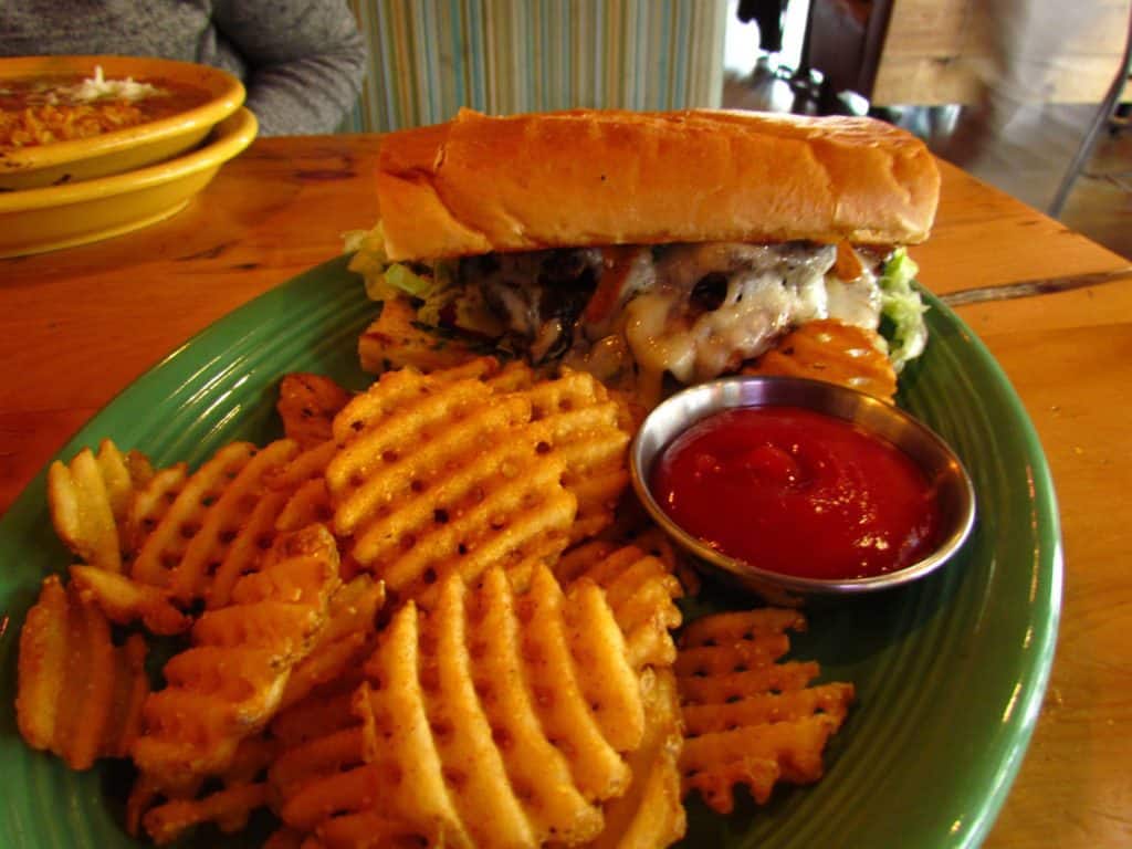 Coco Bolos serves their own version of a Cuban sandwich along with a helping of waffle fries.