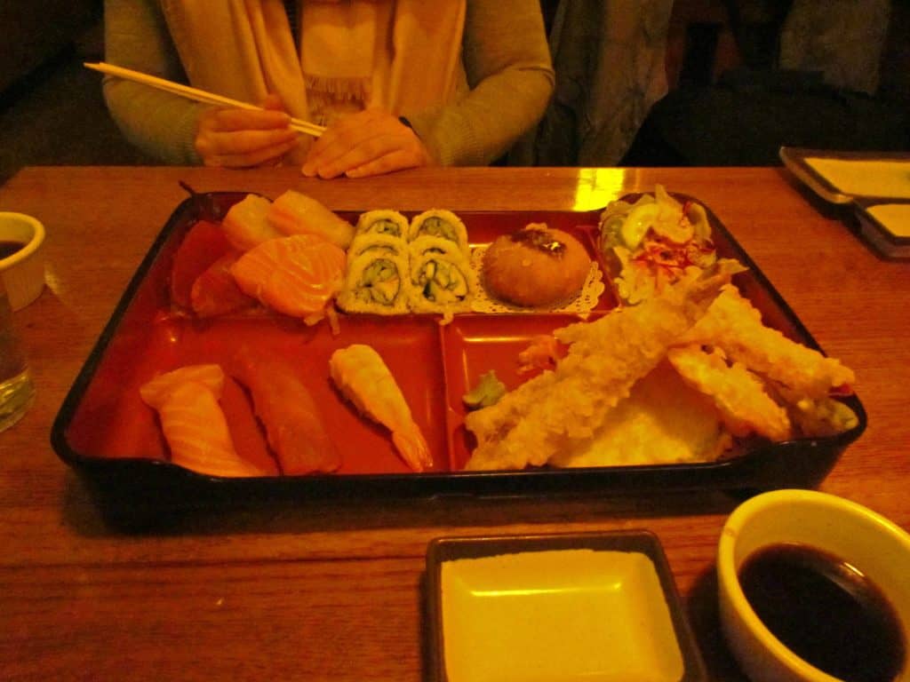 A sushi bento box offers plenty of fresh fish along with other delectable dishes.
