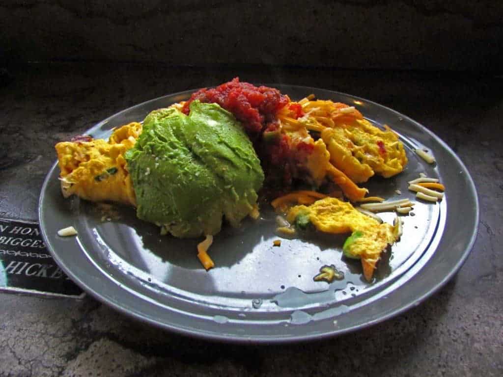 The Migas is a dish featuring scrambled eggs with an assortment of add-ons.