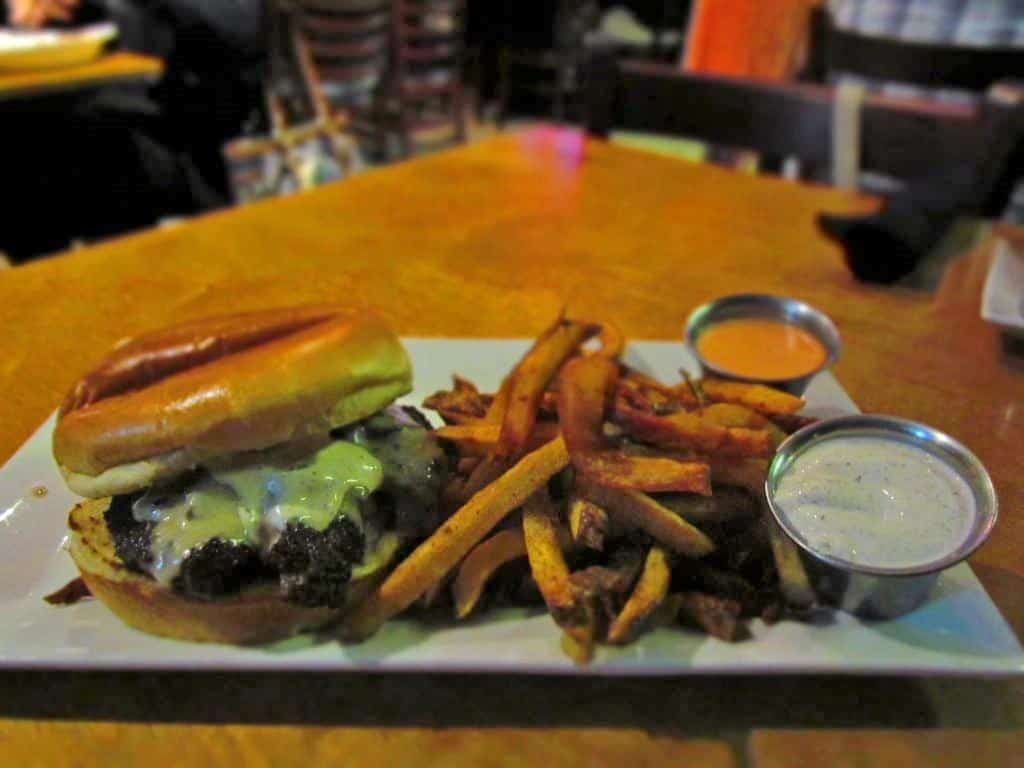 The Mushroom-Swiss Burger is a juicy delight, especially when paired with fresh cooked fries. 