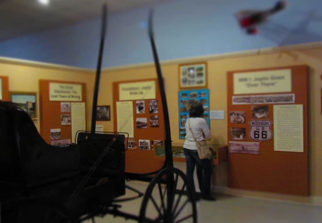 Crystal examines the historical displays at the Joplin Museum Complex.