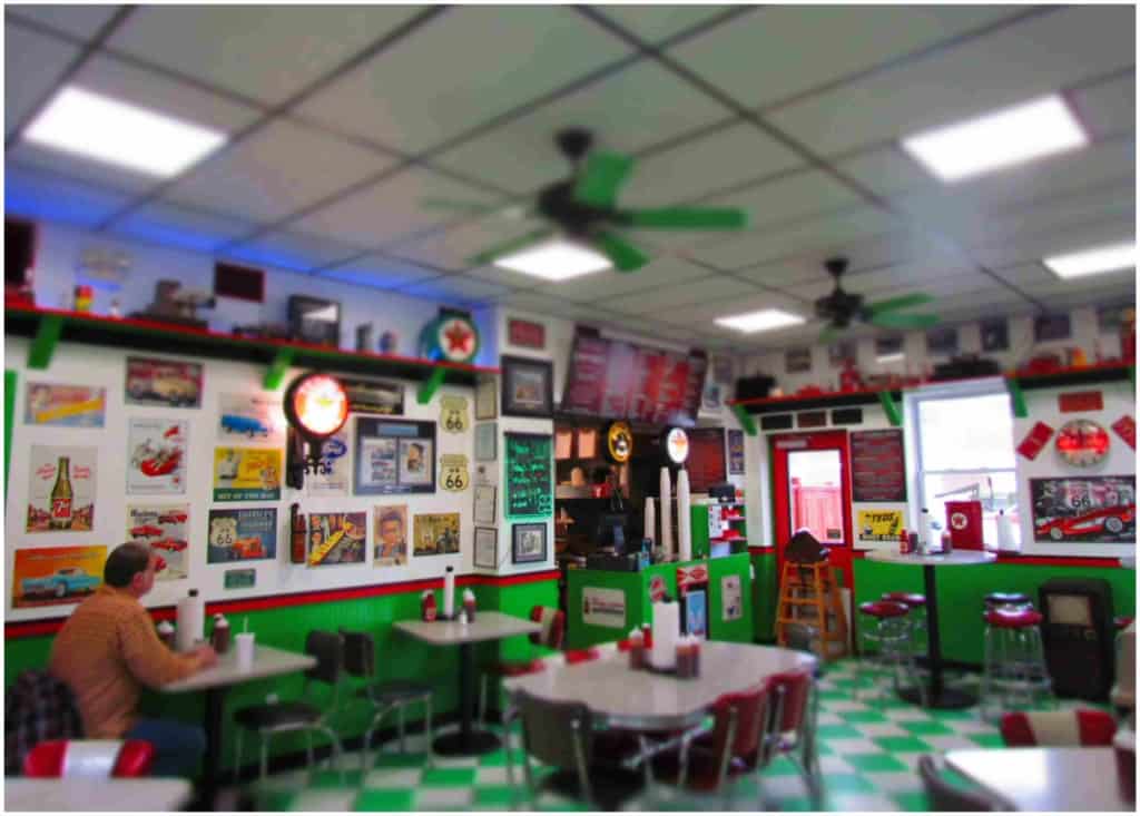 Even the seating at Filling Station BBQ reminds customers of a retro diner.