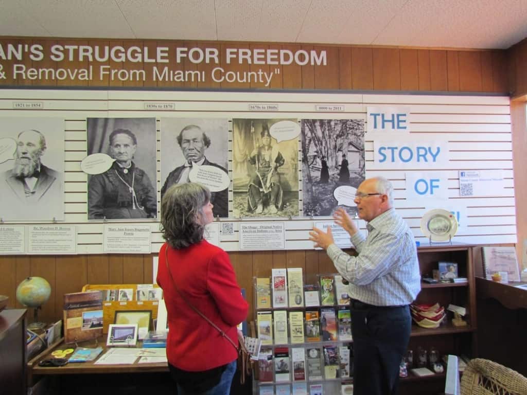 Jim, a staff member at Miami County Historical Museum, explains the timeline to one of the authors.