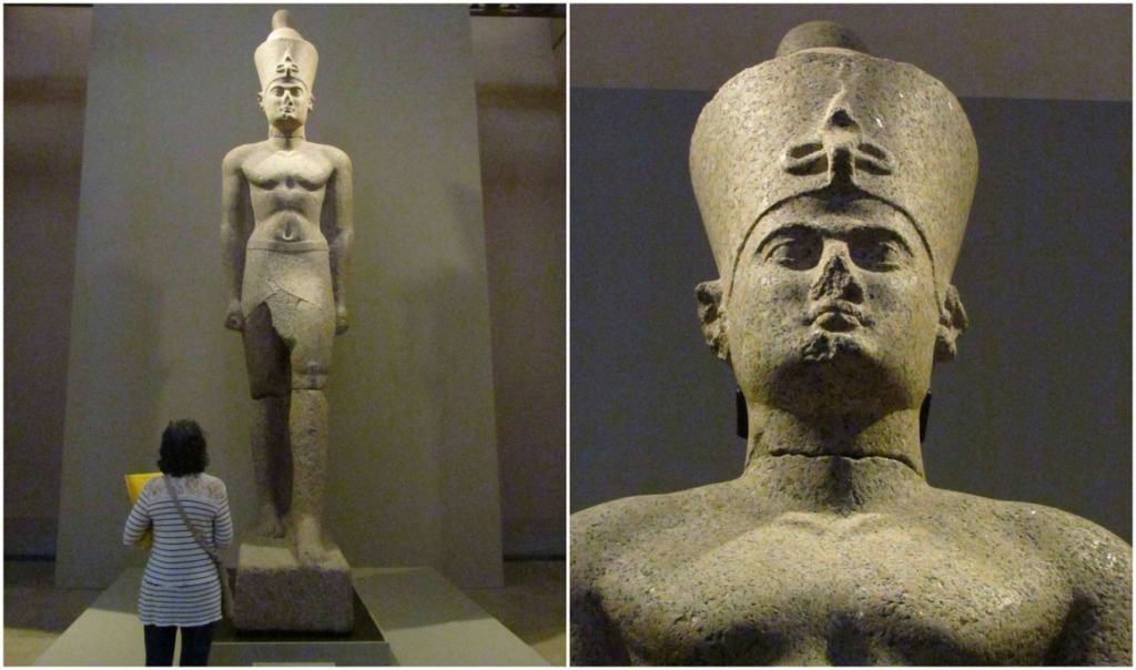 A sixteen foot tall statue of an Egyptian pharaoh stands guard in one of the museum galleries. 