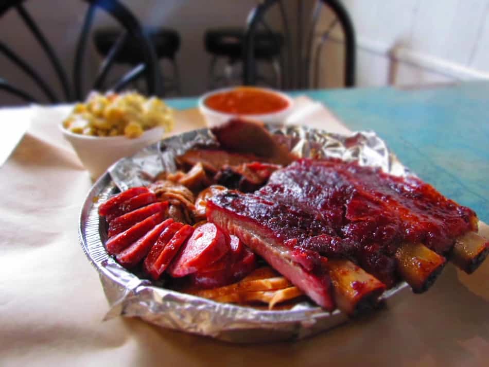The Sampler Platter is packed full of smoked meat varieties and comes with two side dishes.