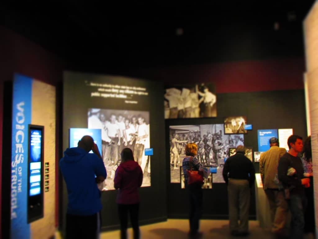 Visitors pause to reflect on the exhibits at the Missouri History Museum.