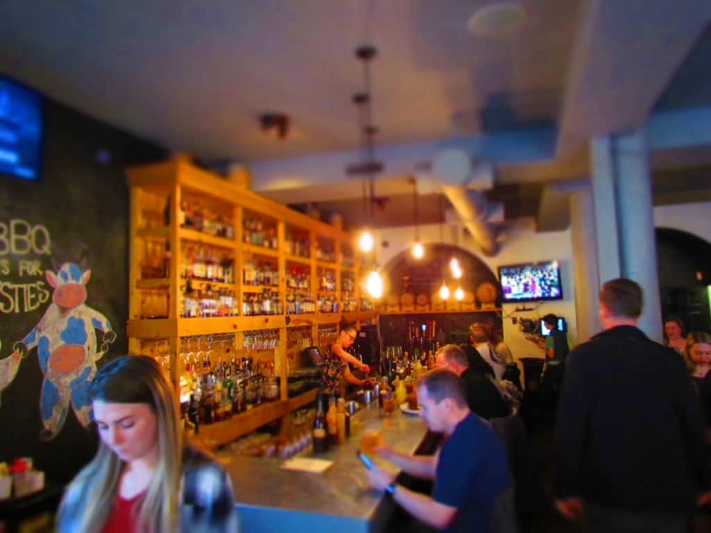 The bar area at Salt and Smoke is a popular place for whiskey drinkers.