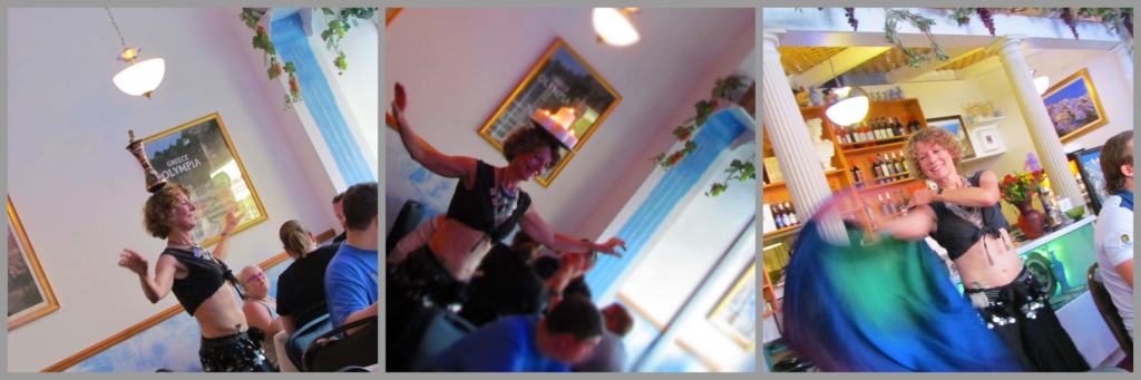 A local belly dancer entertains the crowd of diners.