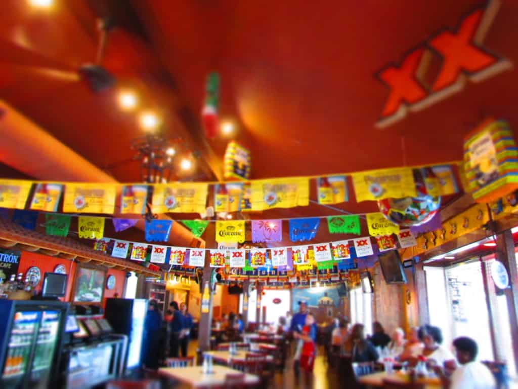 The interior of Taqueria Mexico is bright and happy.