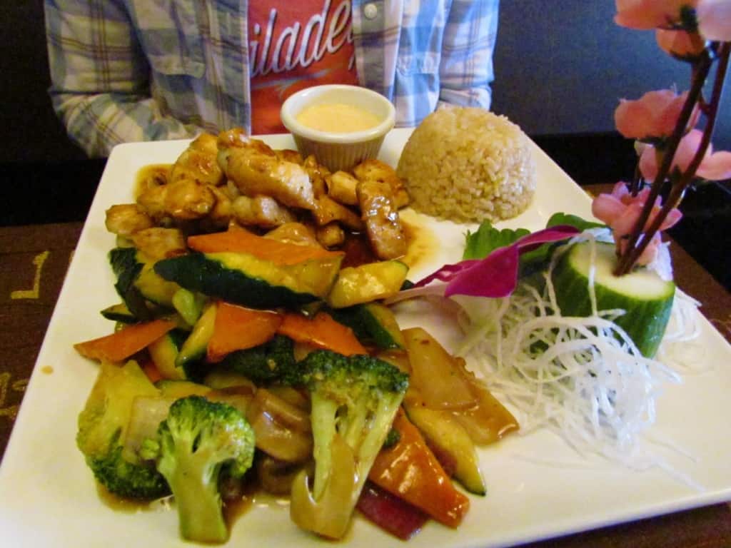 The Hibachi Chicken is a plate full of food. 