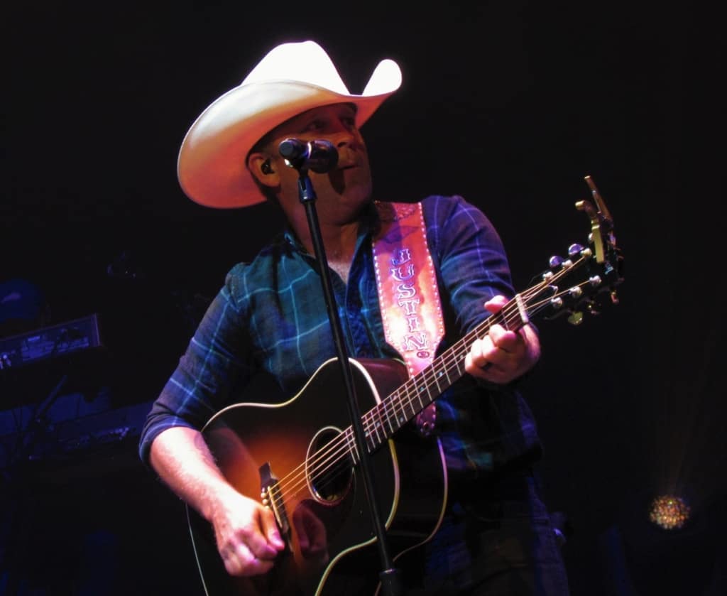 Justin Moore entertains the crowd during a Dodge City Days event. 