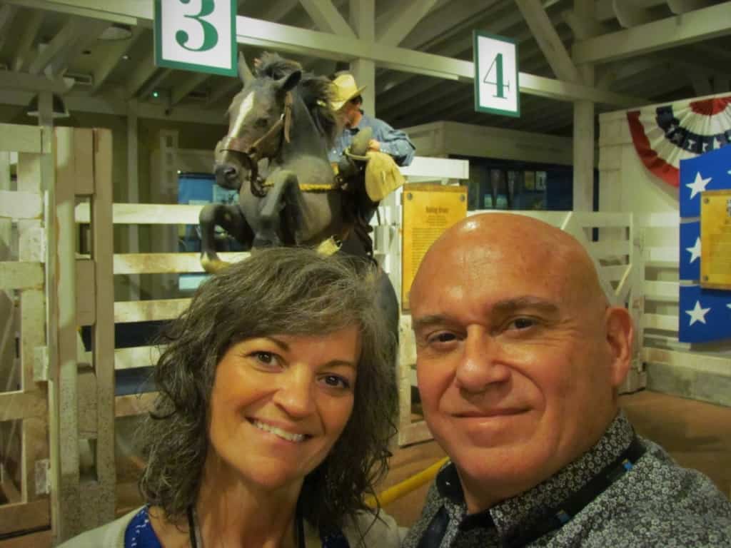 The authors pose for a selfie at one of the predetermined "Selfie Spots" that are found throughout the National Cowboy Museum. 