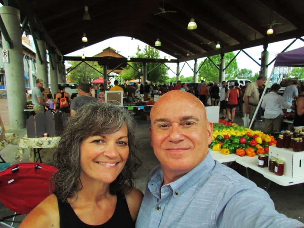 The authors pose for a selfie at the farmers market in Little Rock, Arkansas. 