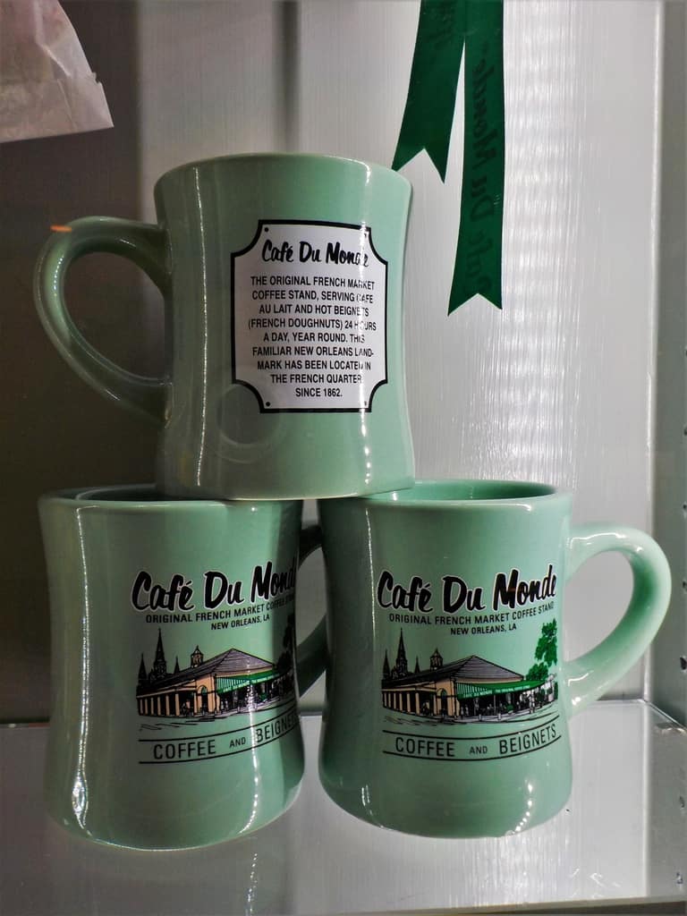 Coffee mugs denote their origin from Cafe Du Monde in New Orleans.