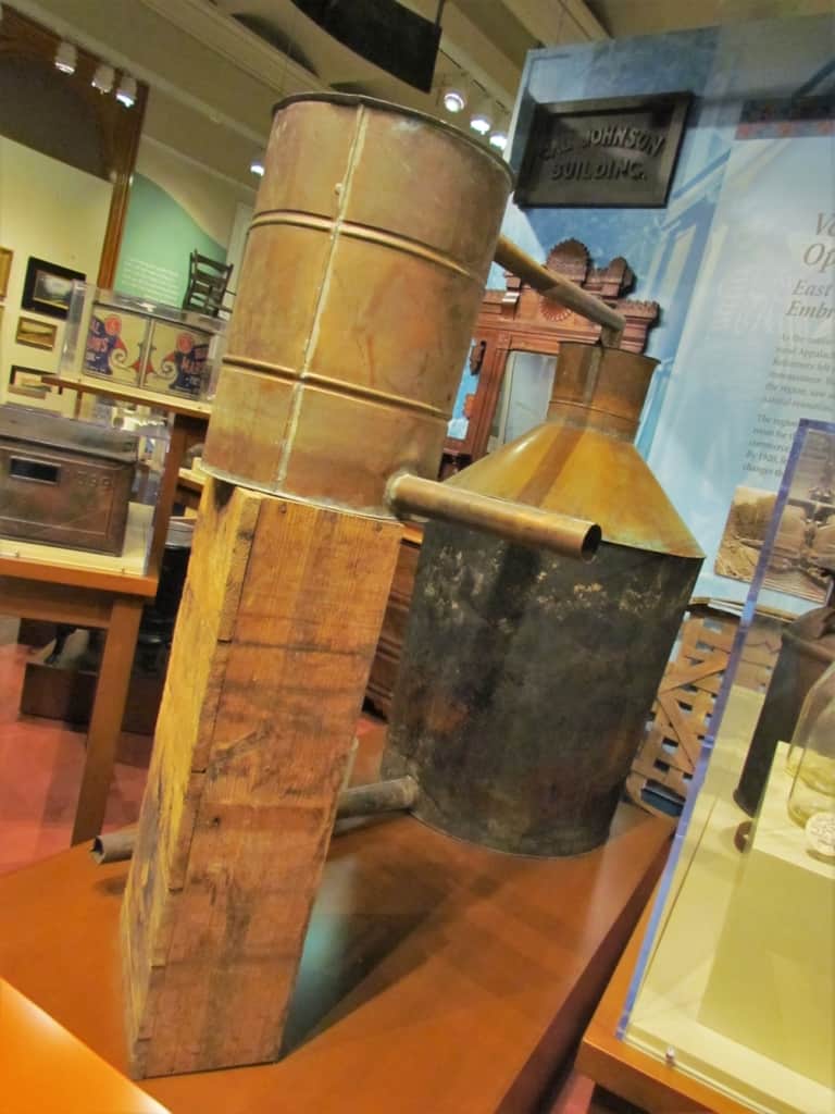 An example of a still that was used by moonshiners to produce alcoholic beverages. 