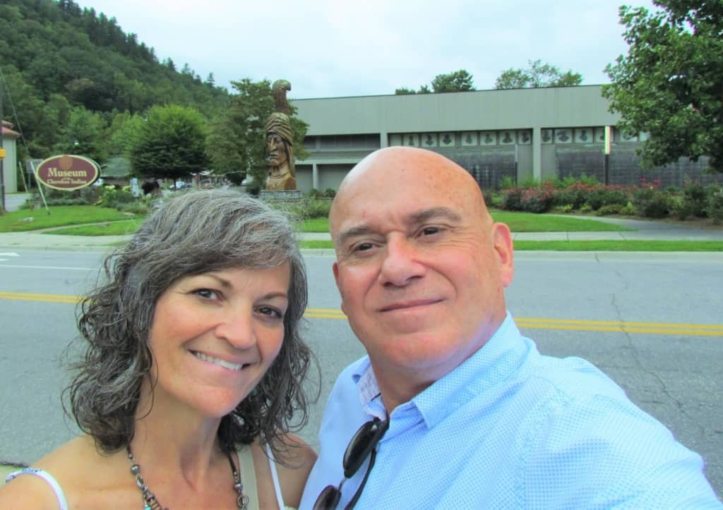 The authors pose outside of the Museum of the Cherokee Indian.