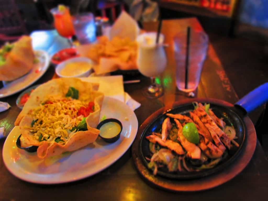A sizzling platter of fajitas is a great addition to a salad.