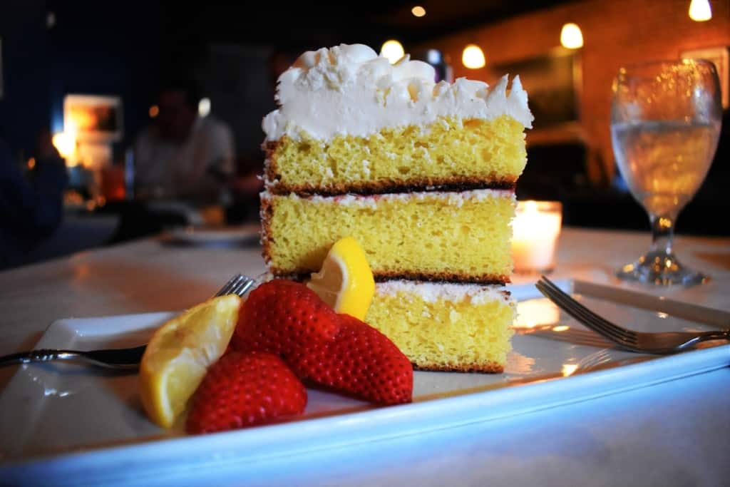 A massive slice of Lemon-Raspberry Cake is too tempting to pass up at Crooner's Lounge. 