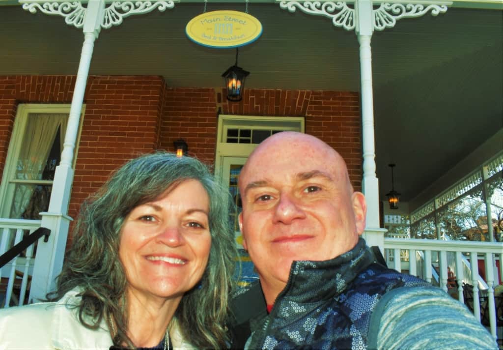 The authors pose for a selfie in front of Main Street Inn in Parkville, Missouri. 
