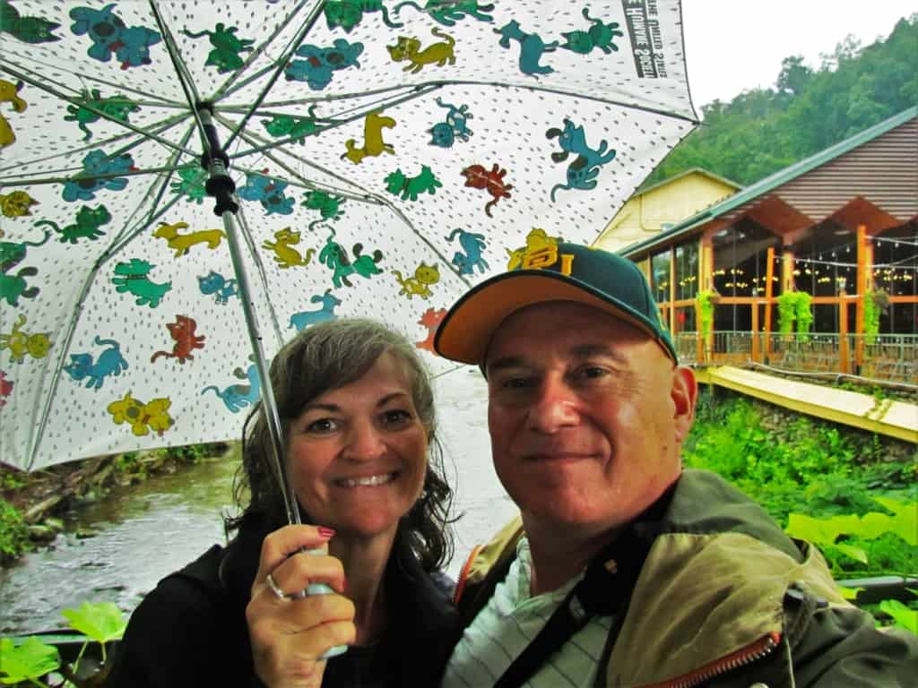 The authors stop for a quick selfie during a brief rain shower in downtown Gatlinburg, Tennessee. 