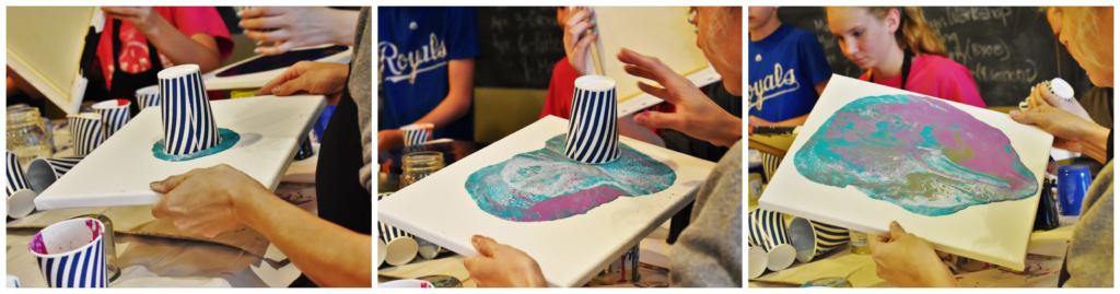 A student creates their own masterpiece with poured paint and a canvas. 