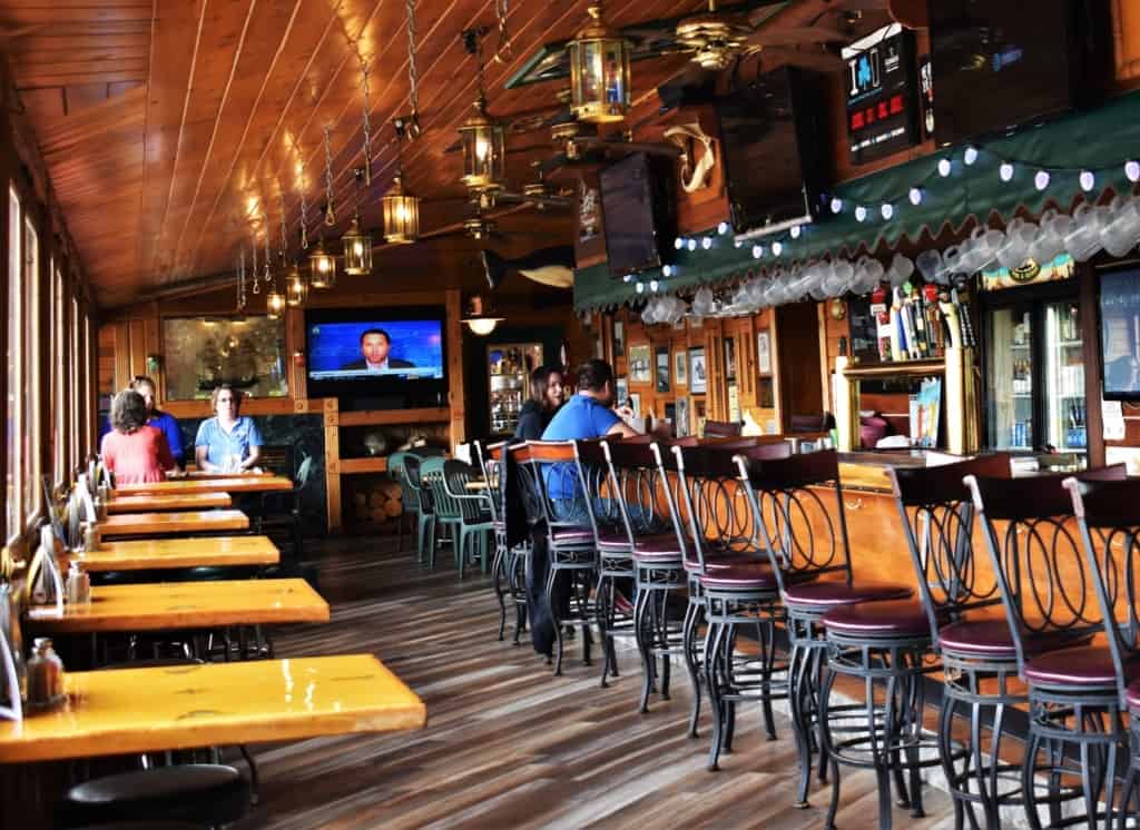 The interior of Boat House Pub is filled with a fun nautical themed decor. 