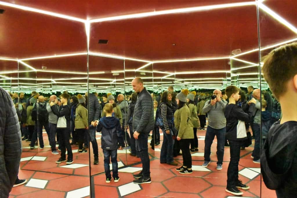 Step into the mirror room and suddenly you feel like you are in a crowd. 