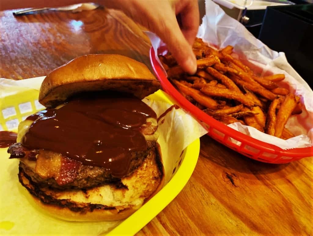 A Smoke Burger at The Burger Stand is kicked up a notch with a special homemade ketchup.